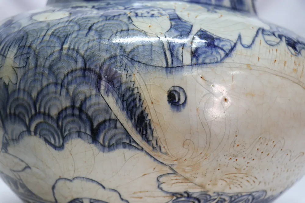 Early Yuan Dynasty Blue and White Porcelain Jar with Fish and Lotus Carving, view 3